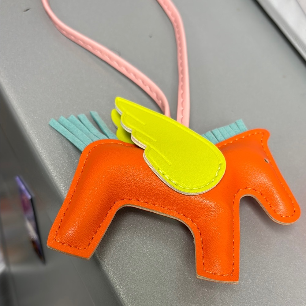 Orange Horse-Shaped Keychain with Yellow Wings - yellow-pink bag charm.